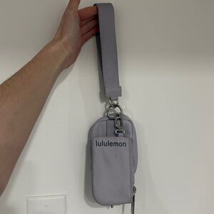 Purple lululemon dual pouch wristlet